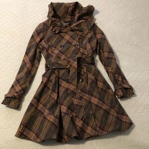 Black Rivet Anthropologie Puckered Plaid swing trench coat. Size 8.
